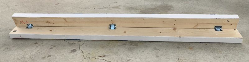 two 2x4s held together by 90 degree brackets